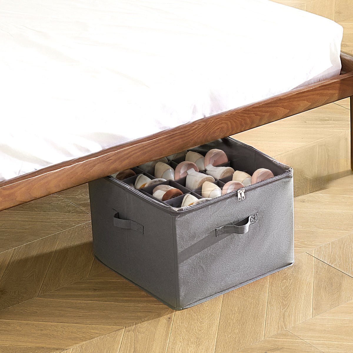 Shoe organizer positioned beside a bed
