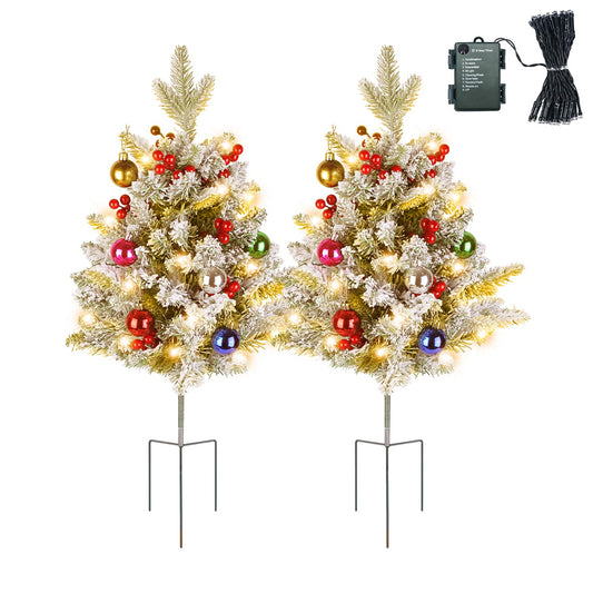 Two trees with battery box and light string shown