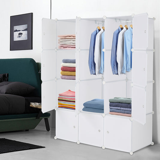 White modular wardrobe with folded and hanging clothing