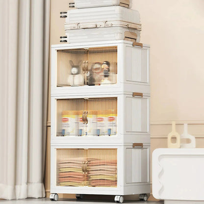 Stacked bins beside a sofa with folded components placed on top