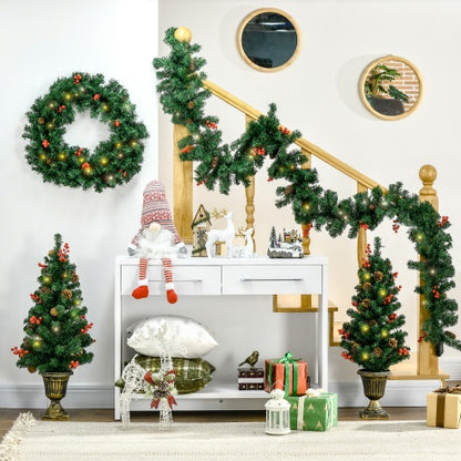 Four-piece illuminated Christmas set at an entryway