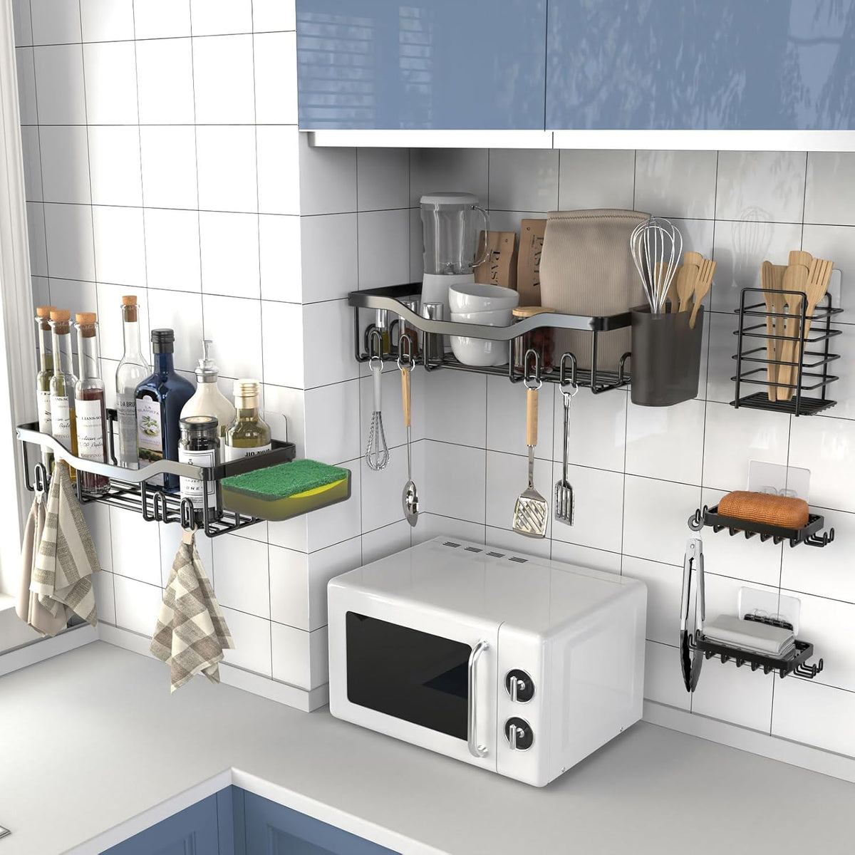 Black storage pieces used in a kitchen display