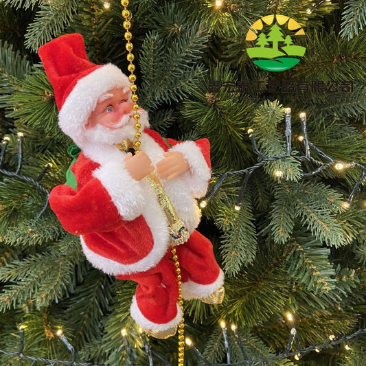 Climbing Santa hanging beside a Christmas tree