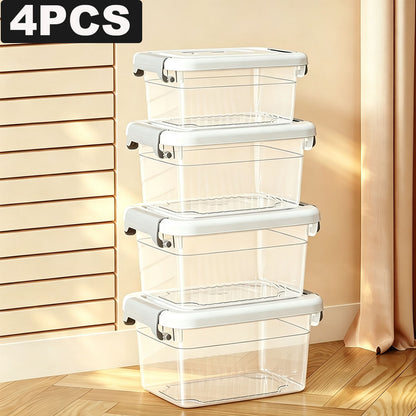 Four clear lidded boxes stacked together