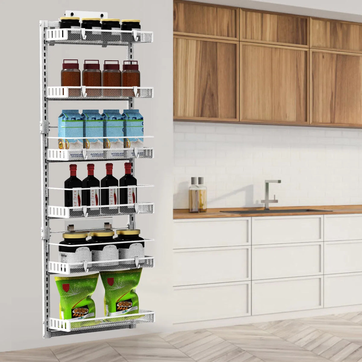 Adjustable basket organizer used on a pantry door